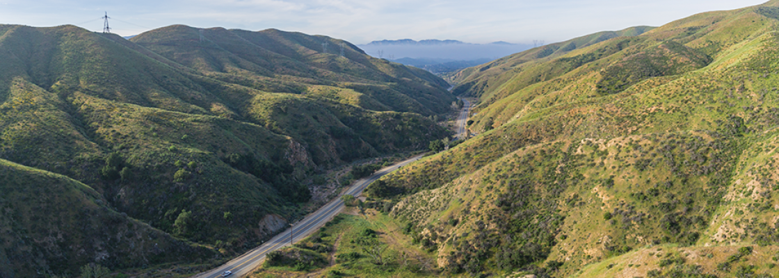 mountains in Canyon Country with freeway running between